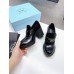 Prada Chocolate High-heeled Loafers In Black Brushed Leather