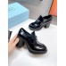 Prada Chocolate High-heeled Loafers In Black Brushed Leather