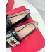 Roger Vivier Mini Broche Buckle Loafers in Black Patent Leather