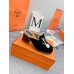 Hermes Flore 60 Mules in Black Suede with Shearling