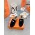 Hermes Flore 60 Mules in Black Suede with Shearling