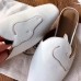Hermes Tangeria Mules In White Calfskin Hermes Tangeria Mules In White Calfskin