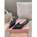 Miu Miu Slingback Pumps 55mm in Black Patent Leather with Buckles Miu Miu Slingback Pumps 55mm in Black Patent Leather with Buckles