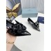 Prada Pumps 45mm in Black Leather with Floral Appliques Prada Pumps 45mm in Black Leather with Floral Appliques