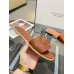 Christian Louboutin CL Mules in Brown Leather