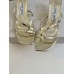 Jimmy Choo Etana 50 Mule Sandals in Gold Metallic Leather