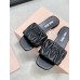 Miu Miu Women's Slides in Black Matelasse Nappa Leather Miu Miu Women's Slides in Black Matelasse Nappa Leather