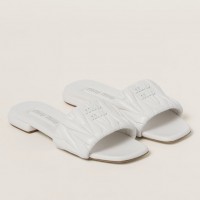 Miu Miu Women's Slides in White Matelasse Nappa Leather Miu Miu Women's Slides in White Matelasse Nappa Leather