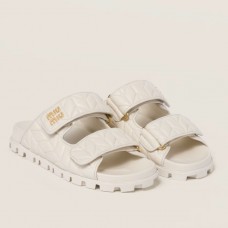 Miu Miu Women's Slide Sandals in White Matelasse Nappa Leather Miu Miu Women's Slide Sandals in White Matelasse Nappa Leather