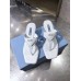 Prada Heeled Thong Sandals In White Brushed Leather