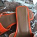 Hermes Oran Slide Sandals In Orange Patent Calfskin