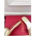 Valentino VLogo Cut-out Slide Sandals in Gold Metallic Leather
