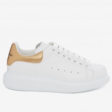 Alexander McQueen Women's Oversized Sneakers With Gold Heel Alexander McQueen Women's Oversized Sneakers With Gold Heel