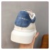 Alexander McQueen Women's Oversized Sneakers With Blue Suede Heel Alexander McQueen Women's Oversized Sneakers With Blue Suede Heel