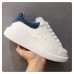 Alexander McQueen Women's Oversized Sneakers With Blue Suede Heel Alexander McQueen Women's Oversized Sneakers With Blue Suede Heel