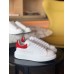 Alexander McQueen Women's Oversized Sneakers With Red Suede Heel Alexander McQueen Women's Oversized Sneakers With Red Suede Heel