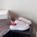 Alexander McQueen Women's Oversized Sneakers With Red Suede Heel Alexander McQueen Women's Oversized Sneakers With Red Suede Heel