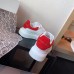 Alexander McQueen Women's Oversized Sneakers With Red Suede Heel Alexander McQueen Women's Oversized Sneakers With Red Suede Heel