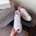 Alexander McQueen Women's Oversized Sneakers With Red Suede Heel Alexander McQueen Women's Oversized Sneakers With Red Suede Heel