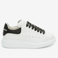 Alexander McQueen Women's Oversized Sneakers With Noir Heel Alexander McQueen Women's Oversized Sneakers With Noir Heel