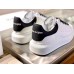 Alexander McQueen Women's Oversized Sneakers With Noir Heel Alexander McQueen Women's Oversized Sneakers With Noir Heel