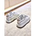 Alexander McQueen Women's White/Black Oversized Sneakers Alexander McQueen Women's White/Black Oversized Sneakers