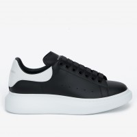 Alexander McQueen Women's Oversized Sneakers With White Heel Alexander McQueen Women's Oversized Sneakers With White Heel