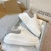 Alexander McQueen Women's Oversized Sneakers With Grey Suede Heel Alexander McQueen Women's Oversized Sneakers With Grey Suede Heel