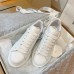 Alexander McQueen Women's Oversized Sneakers With Grey Suede Heel Alexander McQueen Women's Oversized Sneakers With Grey Suede Heel