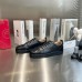 Christian Louboutin Men's Louis Junior Spikes Flat Sneakers In Black Leather Christian Louboutin Men's Louis Junior Spikes Flat Sneakers In Black Leather