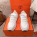 Hermes Men's Addict Sneakers In White Knit Hermes Men's Addict Sneakers In White Knit
