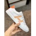 Hermes Men's Avantage Sneakers In White/Orange Calfskin Hermes Men's Avantage Sneakers In White/Orange Calfskin