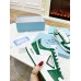 Prada Men's Downtown Sneakers in White and Green Leather Prada Men's Downtown Sneakers in White and Green Leather