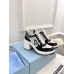 Prada Downtown High-heeled Sneakers in Black and White Leather