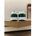 Saint Laurent Men's SL/61 Sneakers in Green and White Leather Saint Laurent Men's SL/61 Sneakers in Green and White Leather