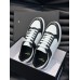 Saint Laurent Men's SL/61 Sneakers in Black and White Leather
