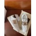 Valentino Women's Rockstud Untitled Sneakers with Gold Stripe